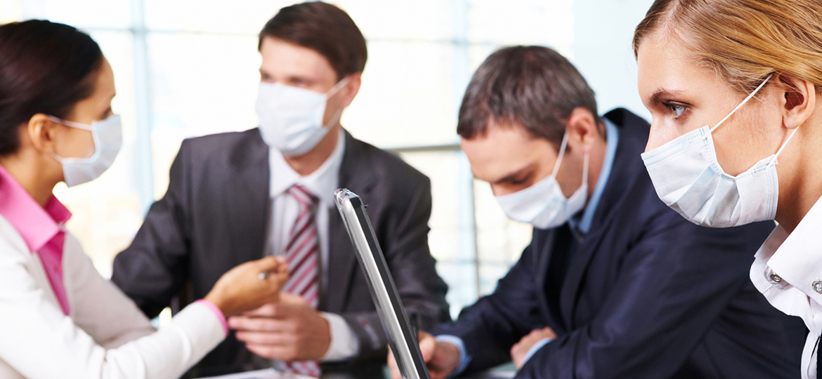 Office workers wearing hospital masks